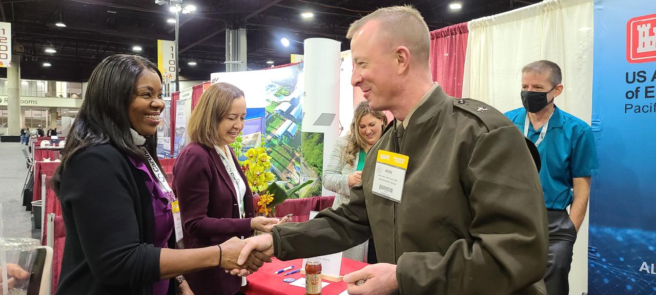 Small Business Chief Monique Holmes with Pacific Ocean Division Commander Brig. Gen. Kirk Gibbs at the S.A.M.E Small Business Conference in Atlanta GA, November 2021.
