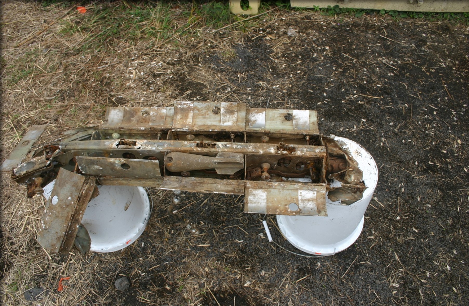 Image of a practice bomb dispenser found at the Former Popoki Target Area.